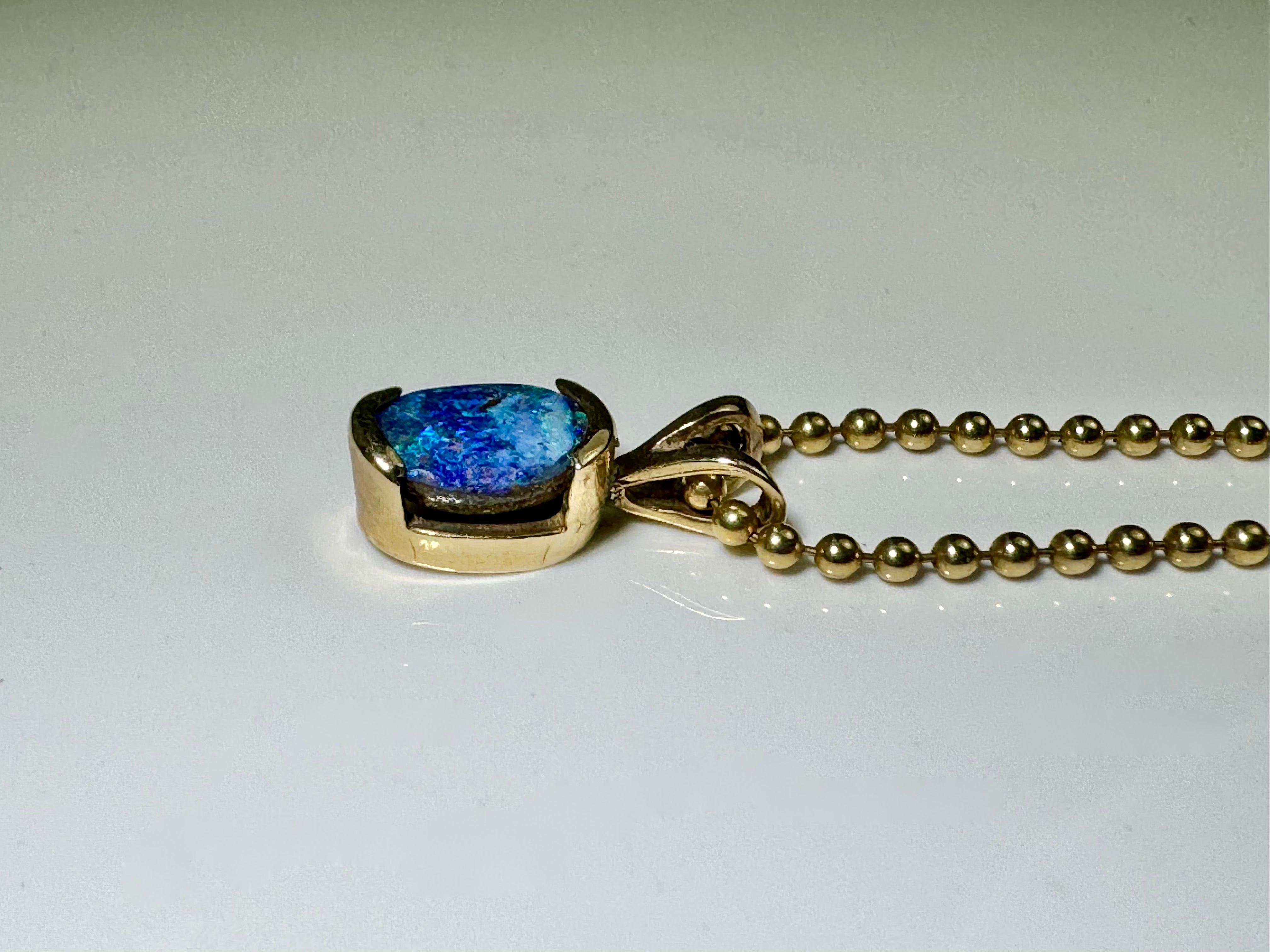 Boulder Opal Oval Gold Pendant