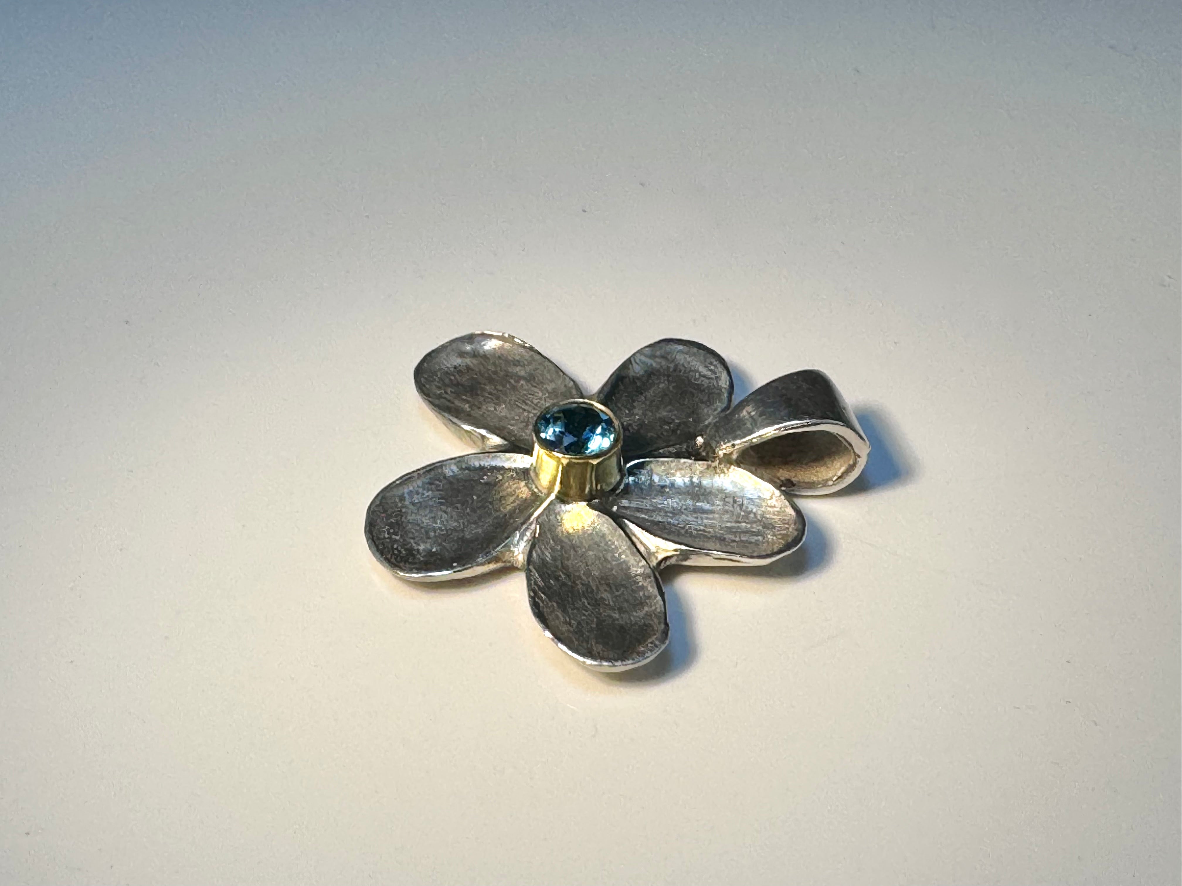 Blue Topaz Flower Sterling Pendant