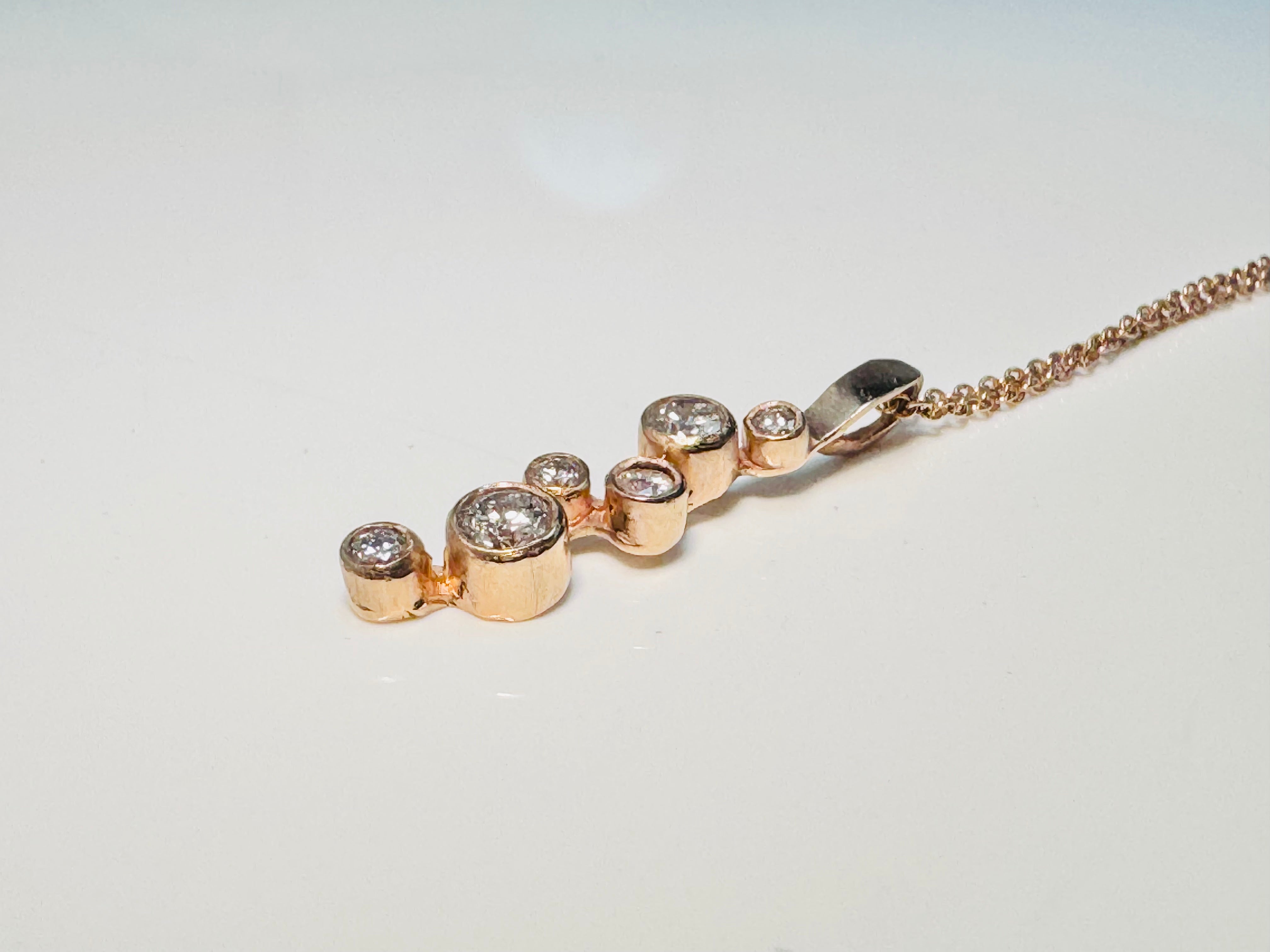 Six Diamond Rose Gold Pendant