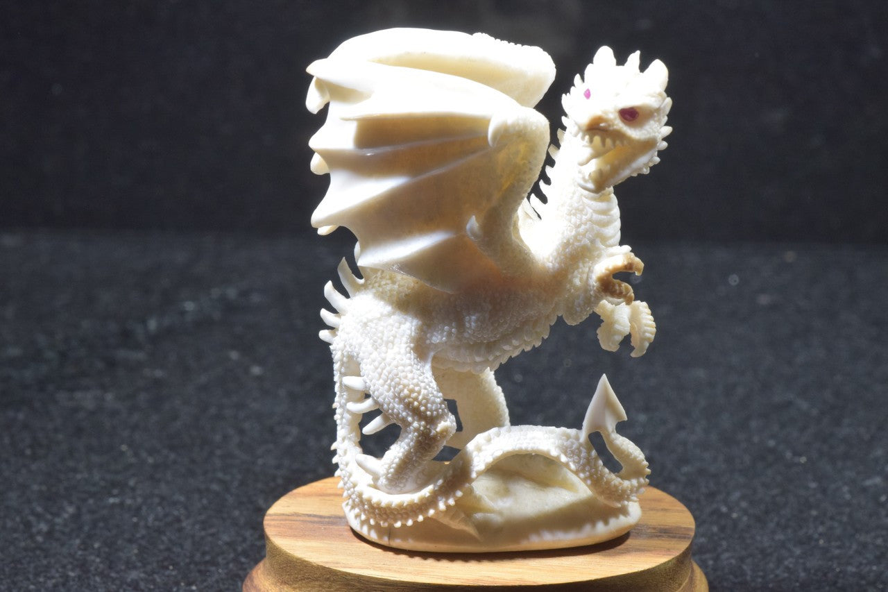 Fossilized Mammoth Tusk Ivory Carved Dragon With Ruby Eyes On An Oak Wooden Base