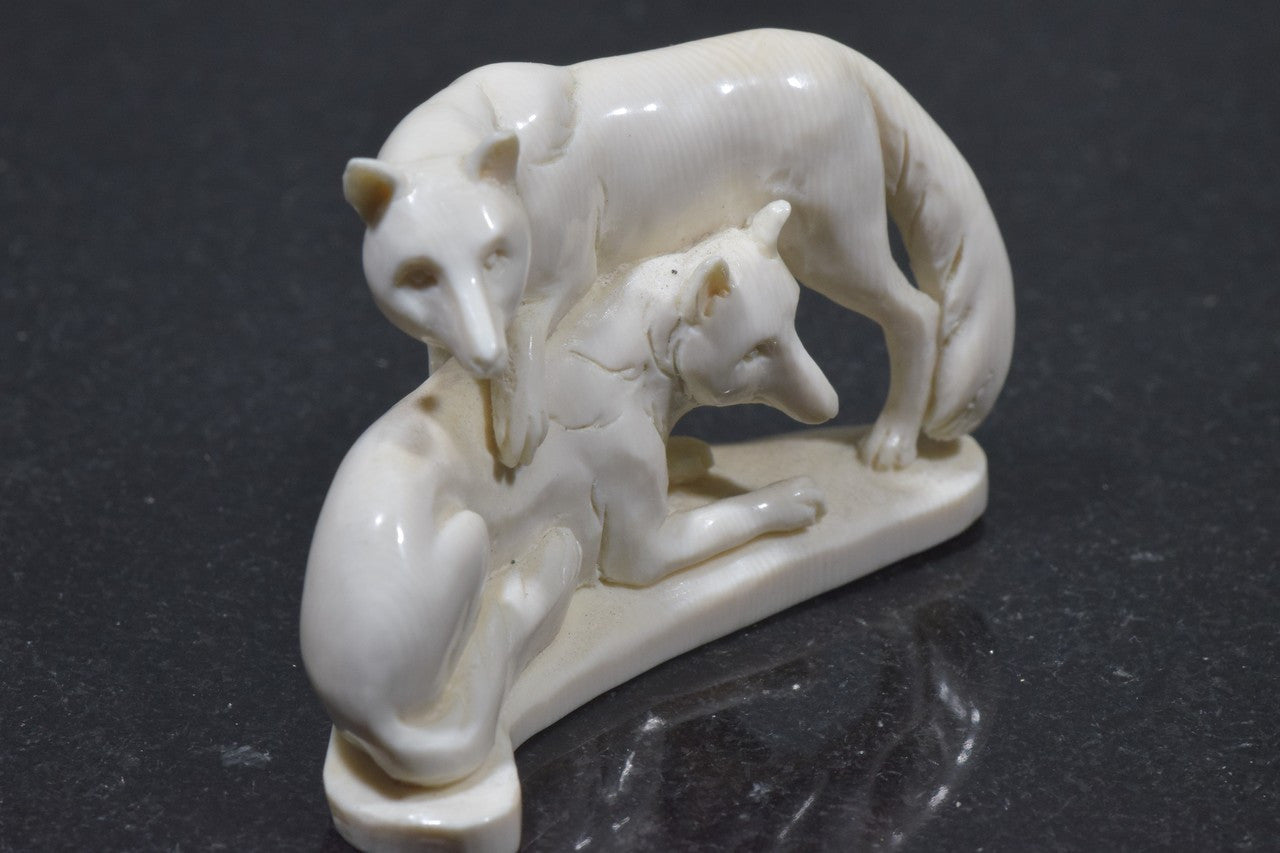 Fossilized Mammoth Tusk Ivory Carving Of Pair of Wolves