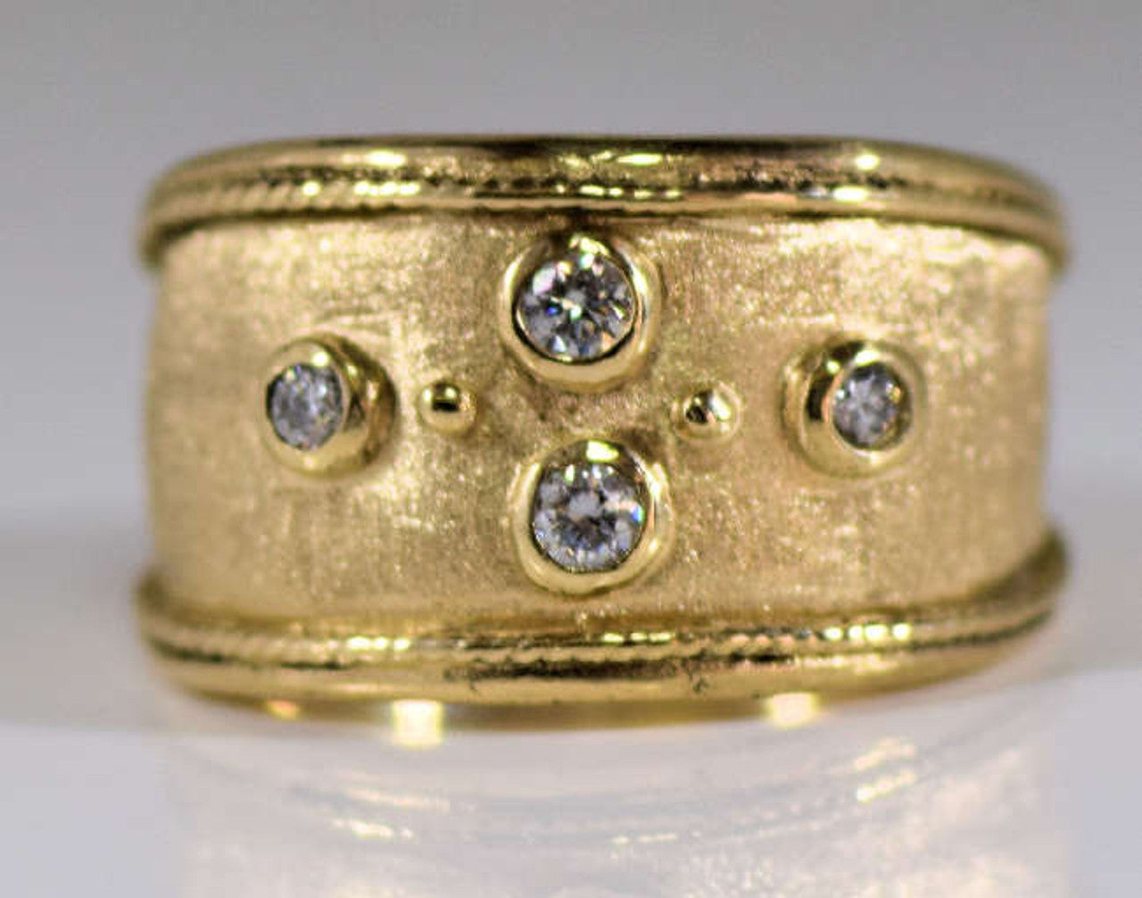 Four Diamond 18K Ring