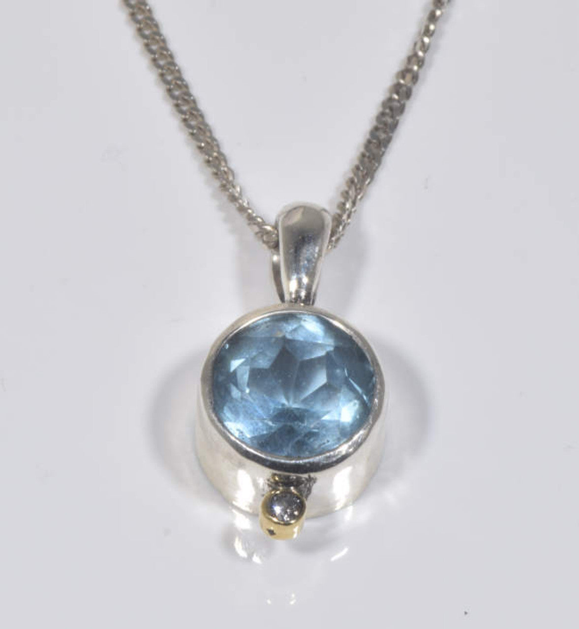 Blue Topaz & Diamond Sterling Silver Pendant