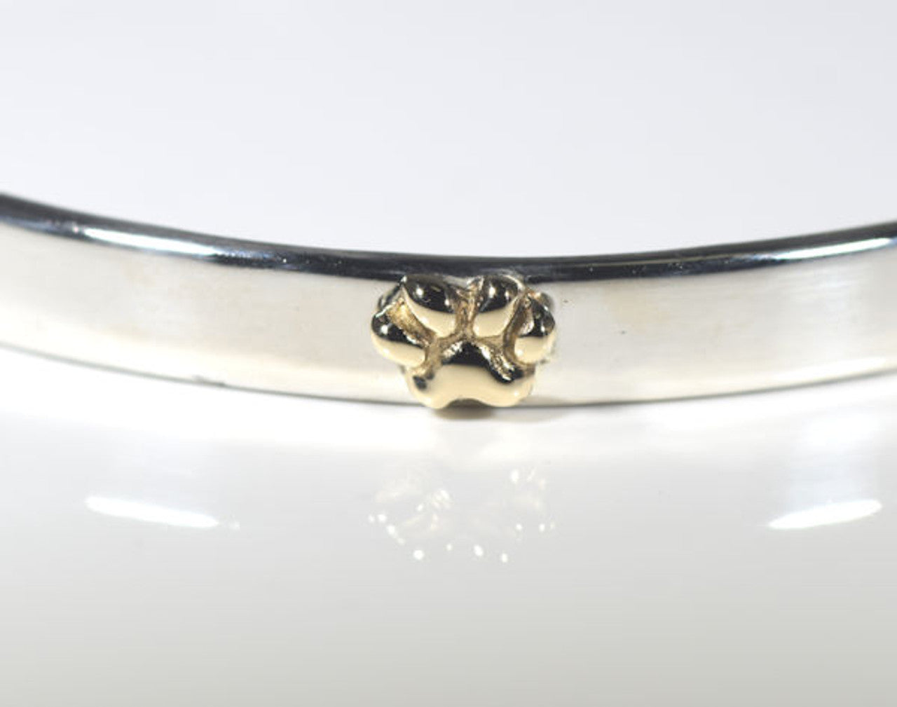 Polished Two Tone Paw Print Bangle