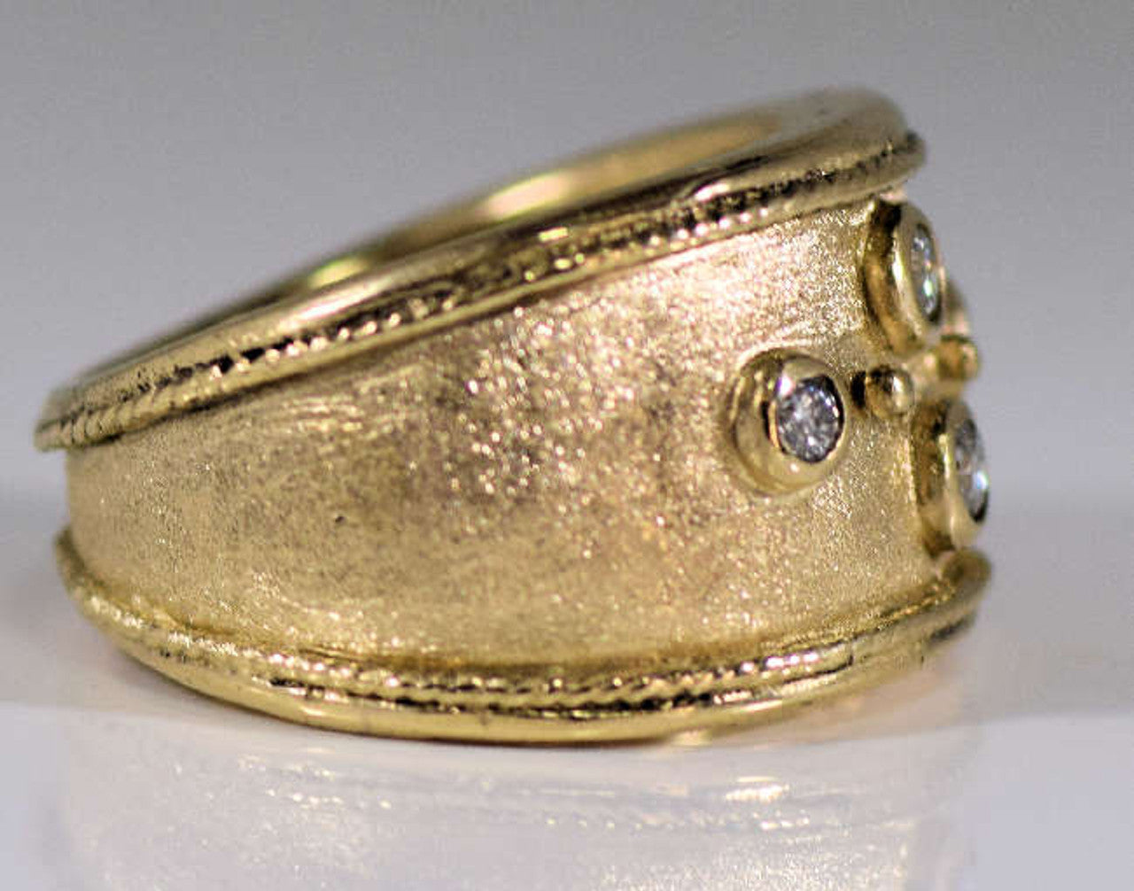 Four Diamond 18 K Gold Ring