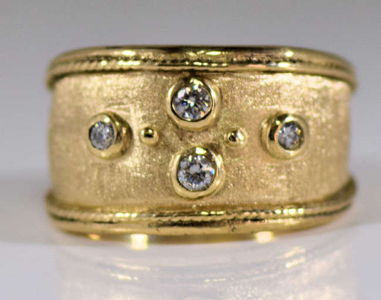 Four Diamond 18 K Gold Ring