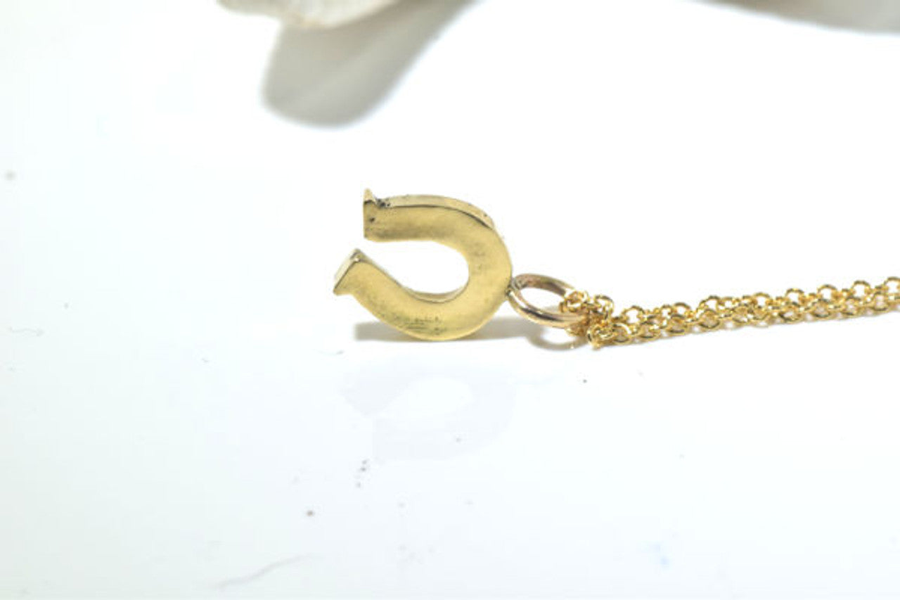 Gold Horse Shoe Pendant